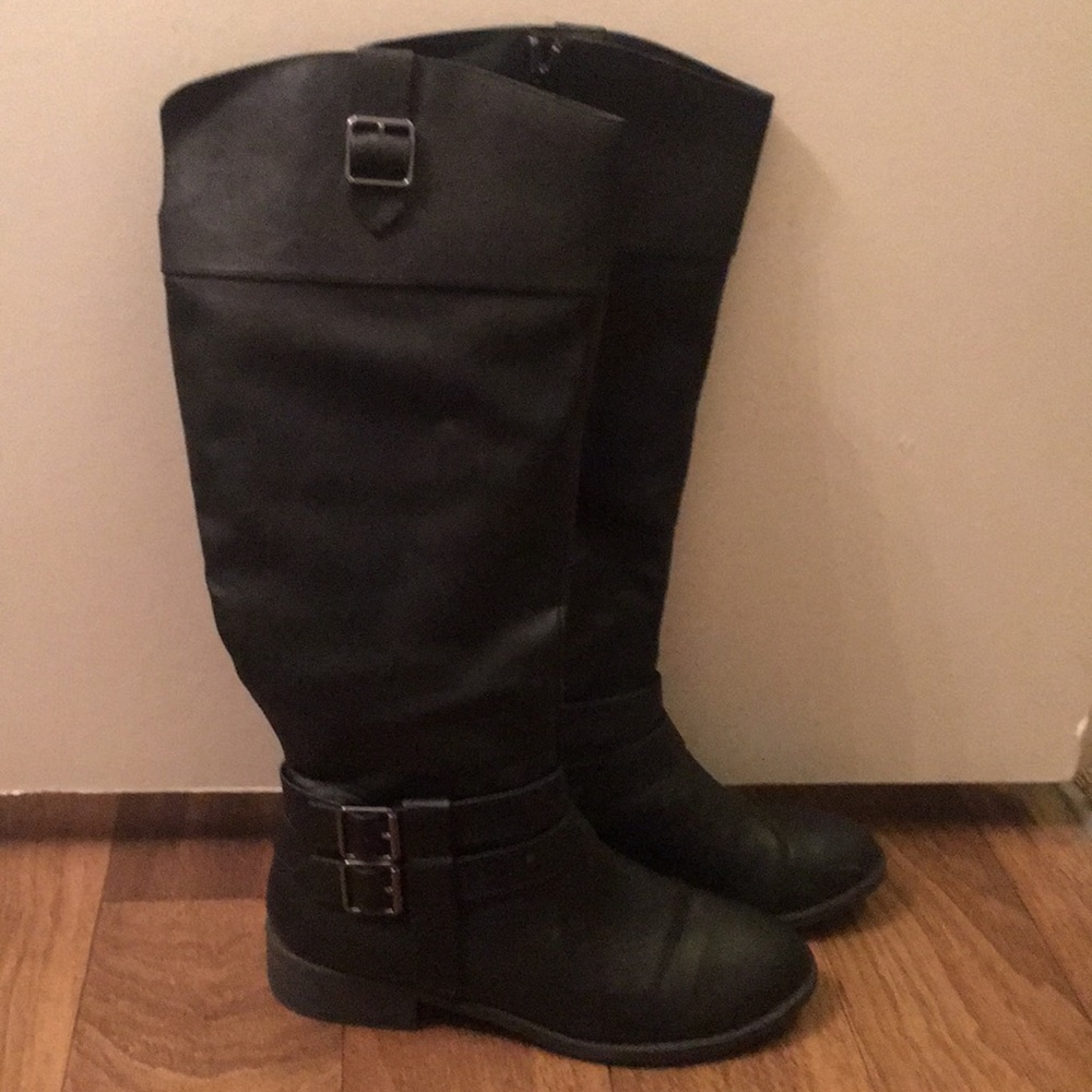 Tall black riding boots